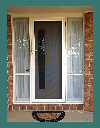 INVISI-GARD security screen door with glass side panels